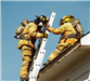 Firefighter Climbing Ladder