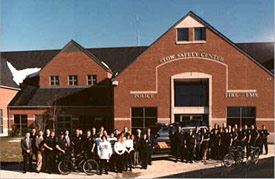 Large Group of People Standing in Front of a Building